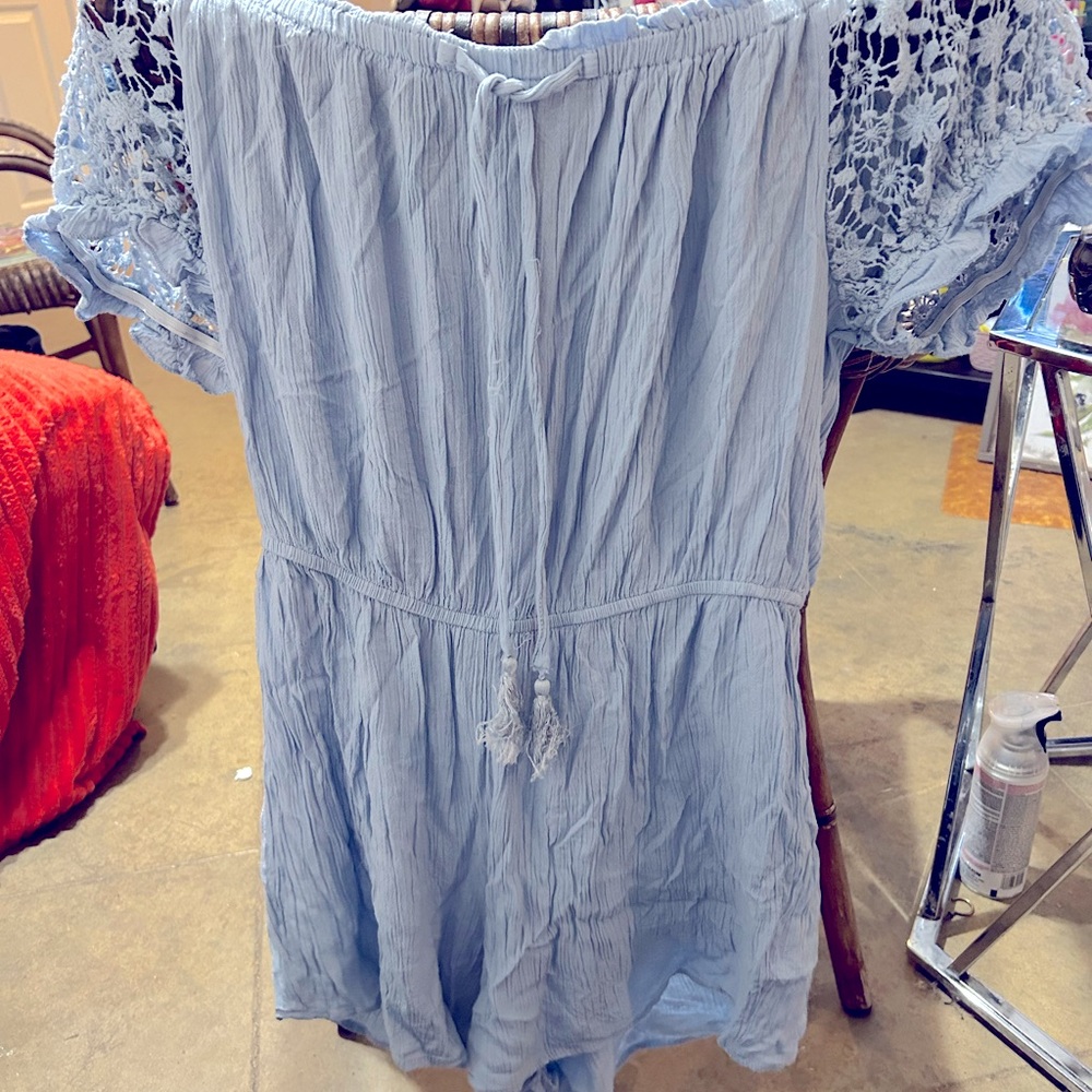 Hint of Blush light blue romper with crocheted sleeves. Gently worn.